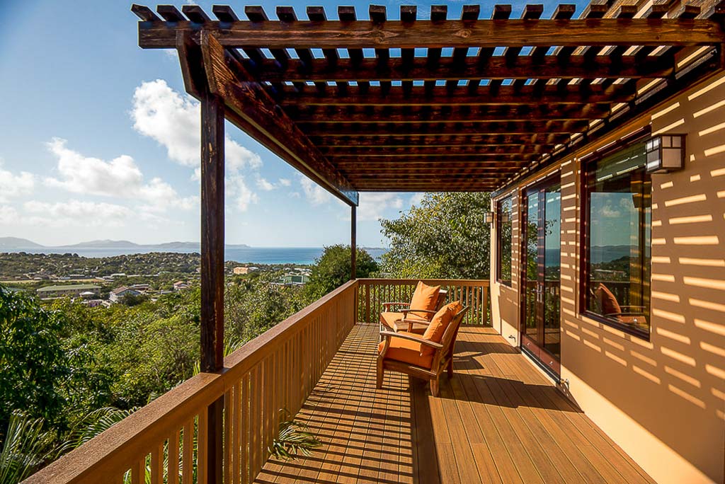 Patio viewing deck at Amateras Villa looking out on the island of Virgin Gorda with the Caribbean Sea in the distance.