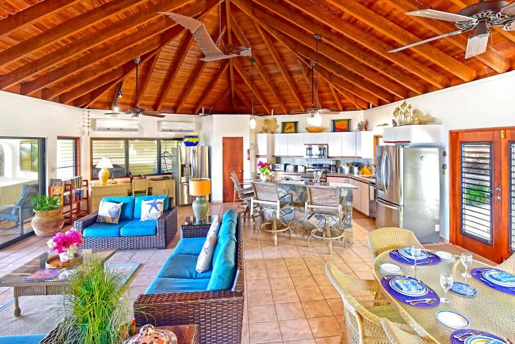 Loblolly Main Room Loblolly Villa’s airy main room with an open kitchen with an island bar and separate dining, living and entertaining areas.